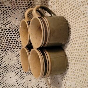 Set of four coffee mugs
